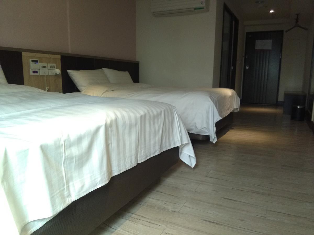 Dengfeng Milan Business Hotel Huwei Exteriör bild