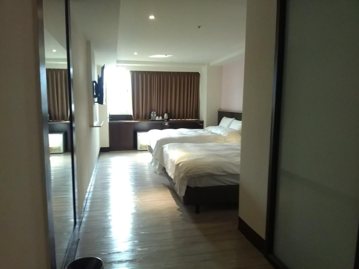 Dengfeng Milan Business Hotel Huwei Exteriör bild